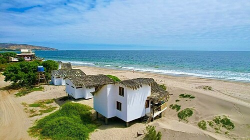 Beach loft hut with private steps onto the beach