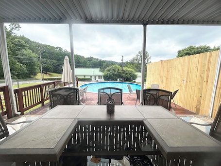 Outdoor dining. Brick By The Bridge - POOL!