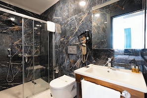 Family Suite, 2 Bedrooms, Partial Sea View | Bathroom | Shower, rainfall showerhead, free toiletries, hair dryer - Berlin Suite Hotel Trabzon (Trabzon)
