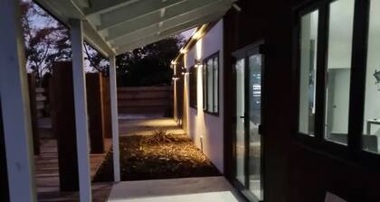 Cheerful 2-bedroom villa garden setting near beach