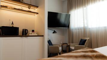 Luxury Studio Suite, 1 King Bed (King Suite 7) | Living area | 55-inch Smart TV with digital channels, TV