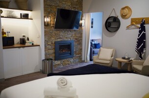 Luxury Suite, 2 Bedrooms (Family Suite 8) | Living area | 55-inch Smart TV with digital channels, TV