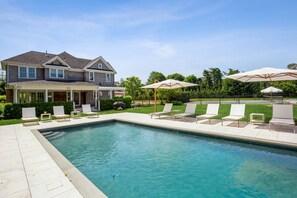 Gunite heated pool w/ electric cover
8 teak lounge chairs & oversized umbrellas