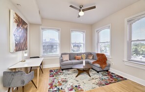 Elite Apartment | Living area | 42-inch Smart TV with digital channels, TV, Netflix -  White House at Grand Central (St. Louis)