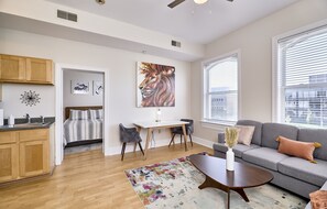 Elite Apartment | Individually decorated, individually furnished, desk, laptop workspace -  White House at Grand Central (St. Louis)