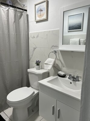 Shower, towels, soap, shampoo