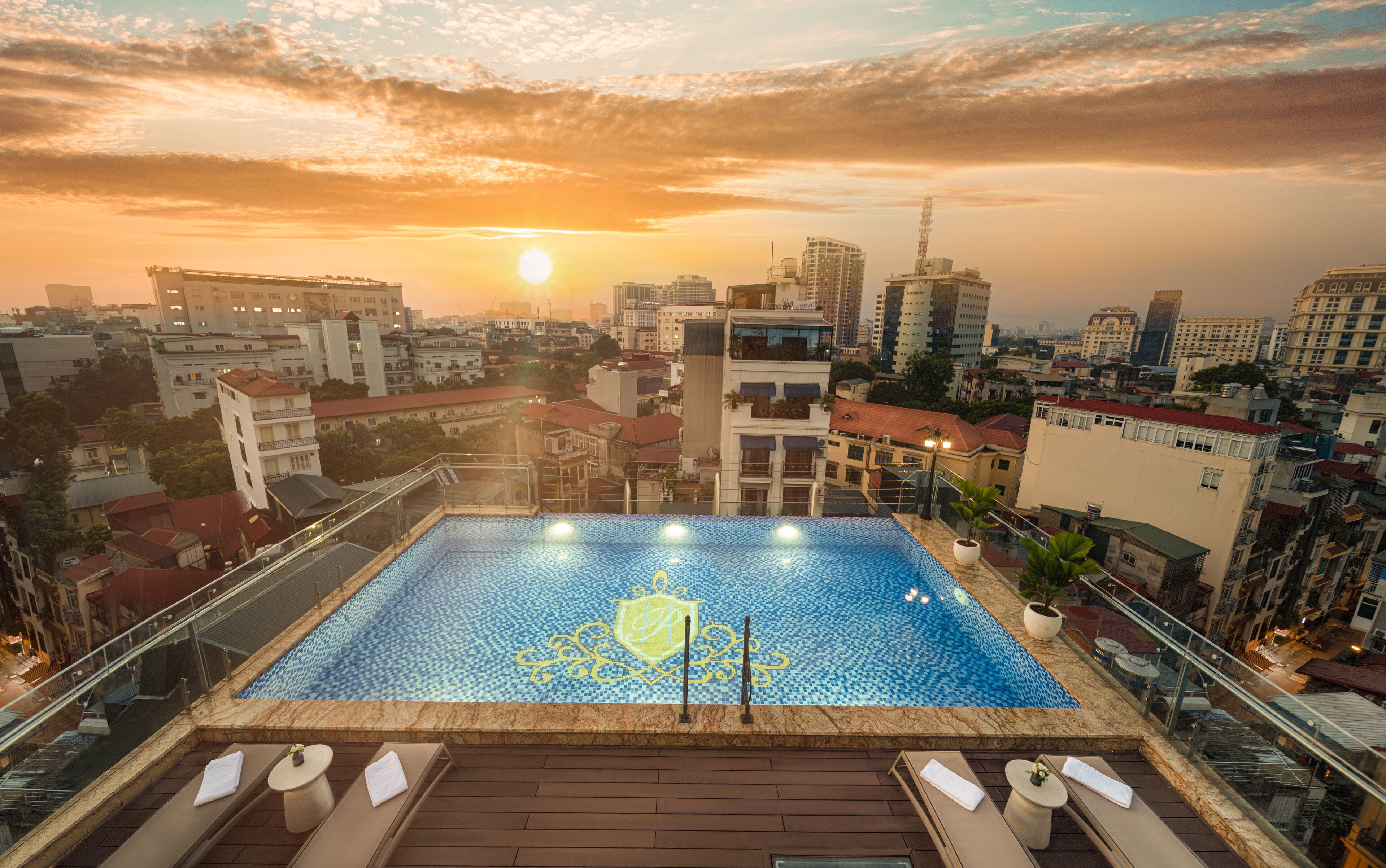 outdoor pool, pool umbrellas, pool loungers