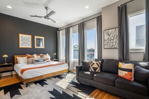 Master bedroom features a king bed and large queen memory foam pull out bed. - Downtown Getaway w/ Rooftop Deck in the Skyline (Houston)