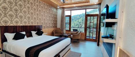 エグゼクティブ ルーム | 羽毛の掛け布団、ピロートップベッド、客室ごとに異なる装飾、客室ごとに異なるインテリア