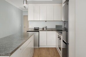 Leilighet – grand | Bad | Hårføner, håndklær og sjampo