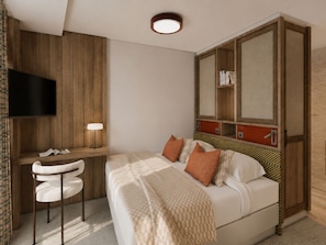Una habitación de hotel con cama, escritorio, silla, televisor y armario.