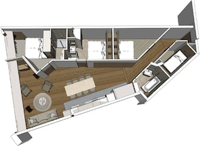 Plano de planta de una habitación de hotel con kitchenette, zona de estar con mesa y sillas, baño pequeño y ventana grande.