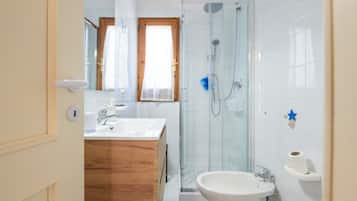 Shower, free toiletries, hair dryer, towels