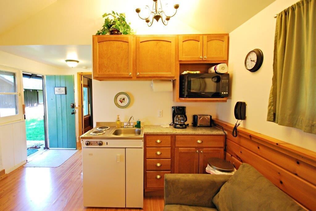 Fridge, microwave, stovetop, coffee/tea maker