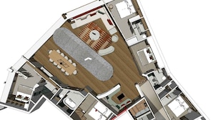 Ein 3D-Grundriss eines Hotels mit einer zentralen Wohnfläche, einem Essbereich und mehreren Schlafzimmern.