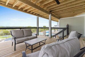 Terrace/patio - Water's Edge by Brunswick Vacation Rentals: Home w/ Pool & Elevator, Near Beach (Ocean Isle Beach)