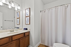 Combined shower/bathtub, hair dryer, towels, soap