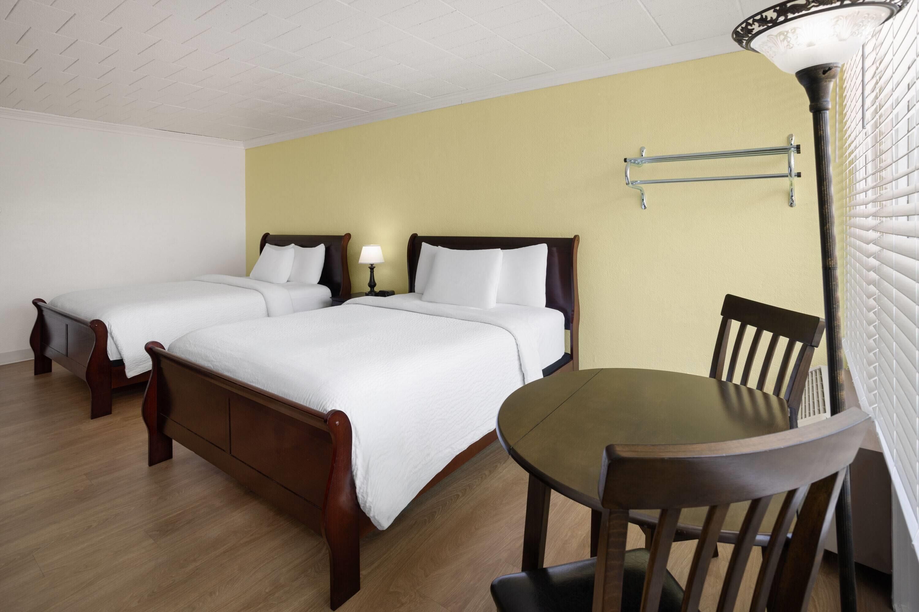 Room, 2 Queen Beds, Non Smoking, Courtyard Area | Down comforters, Tempur-Pedic beds, laptop workspace, iron/ironing board