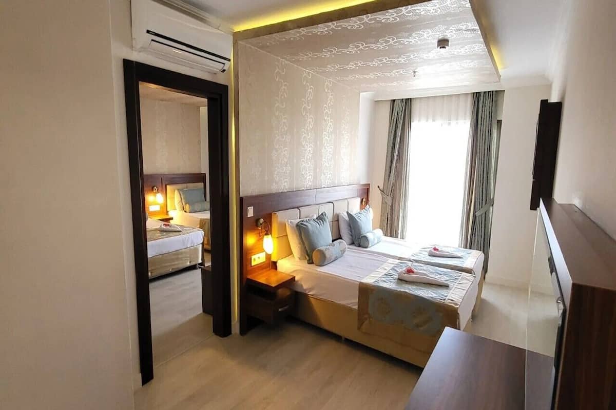 Quarto família | Wi-Fi (sobretaxa), roupa de cama