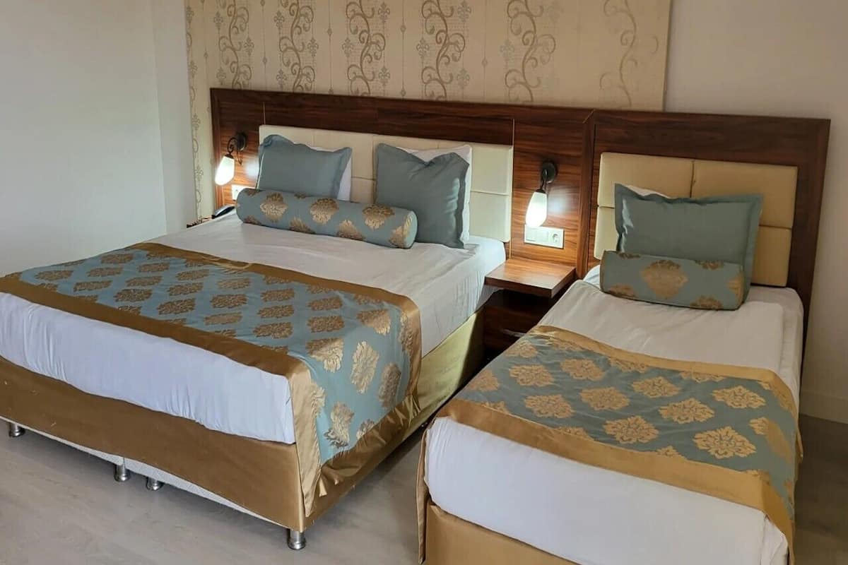 Standard Large Room | Wi-Fi (sobretaxa), roupa de cama