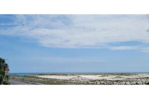 On the beach, sun-loungers, beach towels