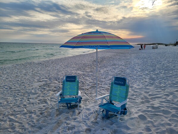 On the beach, sun-loungers, beach towels