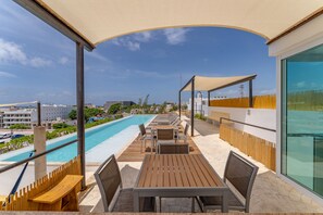 Outdoor dining - Papaya 15 great location Ocean view Rooftop+gym (Playa del Carmen)