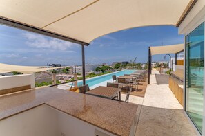 Outdoor dining - Papaya 15 great location Ocean view Rooftop+gym (Playa del Carmen)