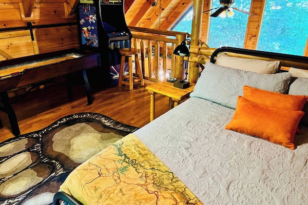 Game loft with queen bed