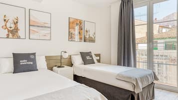 Two-Bedroom Apartment with Balcony | 1 bedroom, individually decorated, desk, laptop workspace