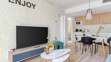 One-Bedroom Apartment with Balcony | Living area | Smart TV