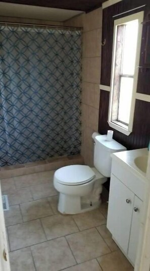 Shower, towels, soap, shampoo