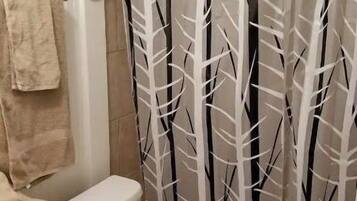 Shower, towels, soap, shampoo