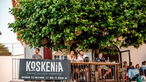 A restaurant named KOSKENIA with outdoor seating and a large tree providing shade. - Auberge Koskenia (Bidart)