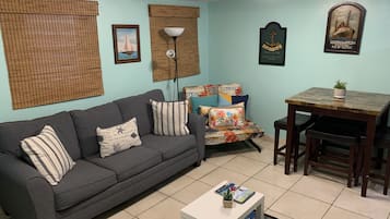 Royal Apartment | Living area | 32-inch LCD TV with digital channels, TV, Netflix