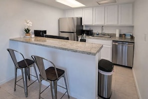 Fridge, microwave, oven, coffee/tea maker