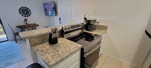 Fridge, microwave, oven, coffee/tea maker - Tiki (1-Bedroom Home) with Pool by RedAwning (South Padre Island)