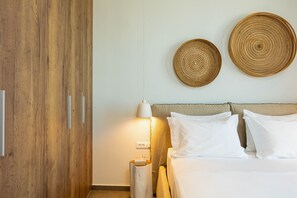 2 chambres, coffres-forts dans les chambres, fer et planche à repasser