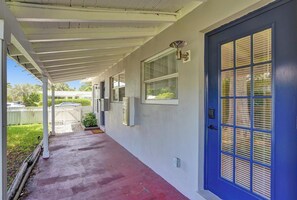 Step out onto the covered porch and enjoy the view from the comfort of your home.