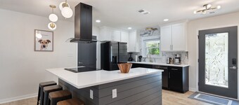 Modern Home with Heated Pool, Game Room, and 4 miles to the Beach!