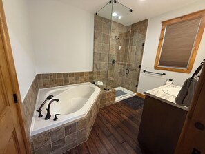Combined shower/tub, hair dryer, towels, soap