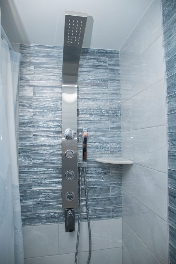Shower, towels, soap, shampoo