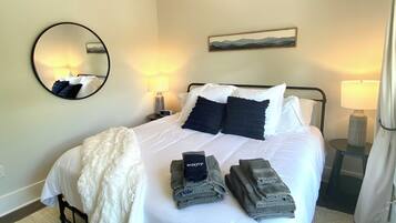 Premium Condo | Premium bedding, iron/ironing board, free WiFi, bed sheets