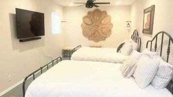 3 bedrooms, desk, iron/ironing board, travel cot