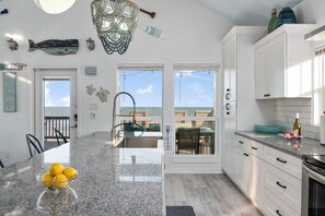 Fridge, microwave, oven, stovetop - Gulf Front Luxury Beach House w/Mini Golf, Hot Tub, Firepit + Family Friendly (Bolivar Peninsula)