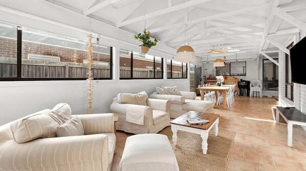 Smart TV, fireplace, books