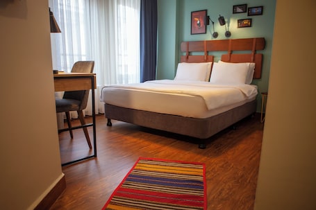 Ropa de cama de alta calidad y minibar