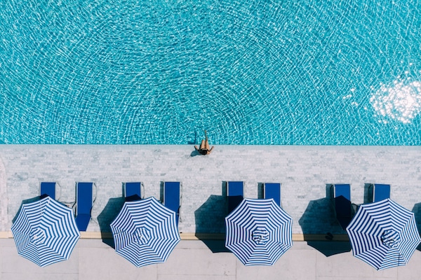 Outdoor pool, open 8:00 AM to 10:00 PM, pool umbrellas, pool loungers