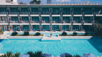 Outdoor pool, open 8:00 AM to 10:00 PM, pool umbrellas, sun loungers