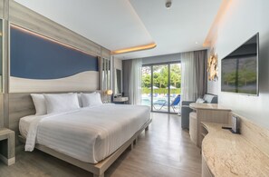 Deluxe Pool Access Room | Minibar, in-room safe, desk, laptop workspace - Seabed Grand Hotel Phuket (Wichit)